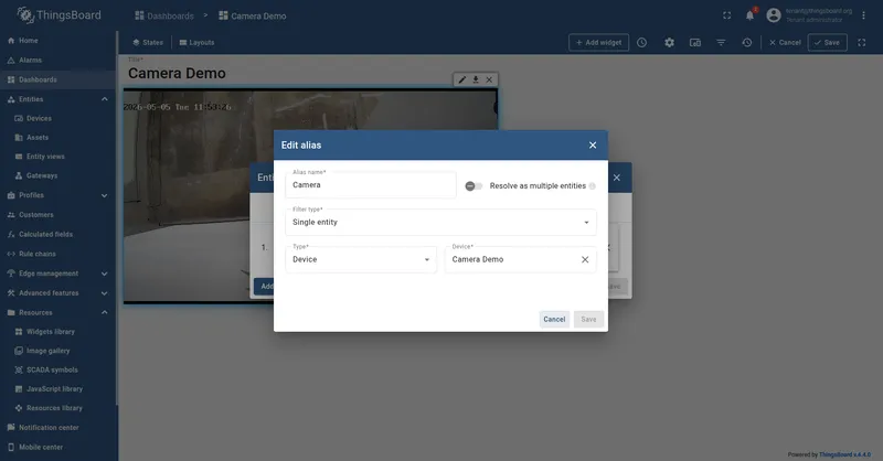 Dashboard in edit mode with a Video Streaming widget already playing a live HLS feed in the background. The Edit alias dialog is open in the foreground configuring a Single entity filter of type Device that resolves to the Camera Demo device.